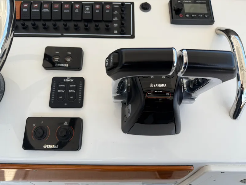 Slide: The Image of Control panel of a 2015 Pursuit S 280 Sport boat with Yamaha throttle. - 15