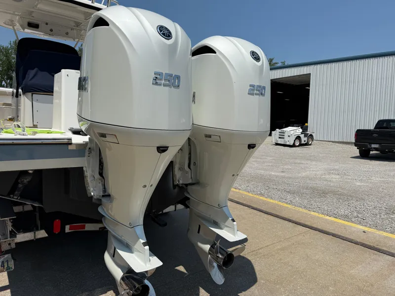 Slide: The Image of Twin Yamaha 250 outboard engines on a 2015 Pursuit S 280 Sport boat. - 7