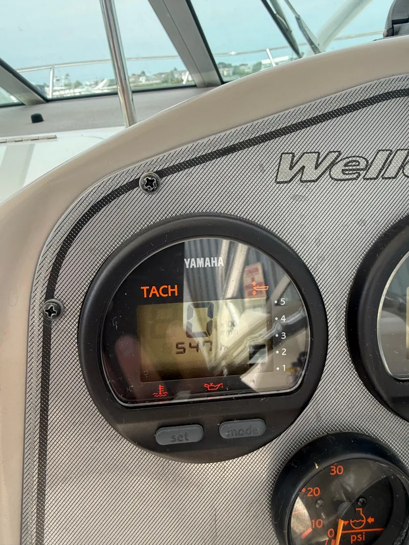 Slide: The Image of Close-up of 2005 Wellcraft 252 Coastal boat dashboard with Yamaha tachometer. - 18