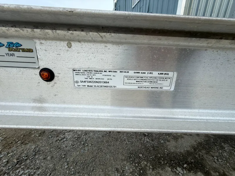 Slide: The Image of Trailer label for Load Rite, 2021, with specifications and safety standards. - 19