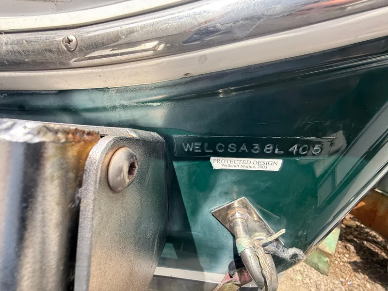 Slide: The Image of Close-up of 2005 Wellcraft 252 Coastal boat hull with serial number and design label. - 20