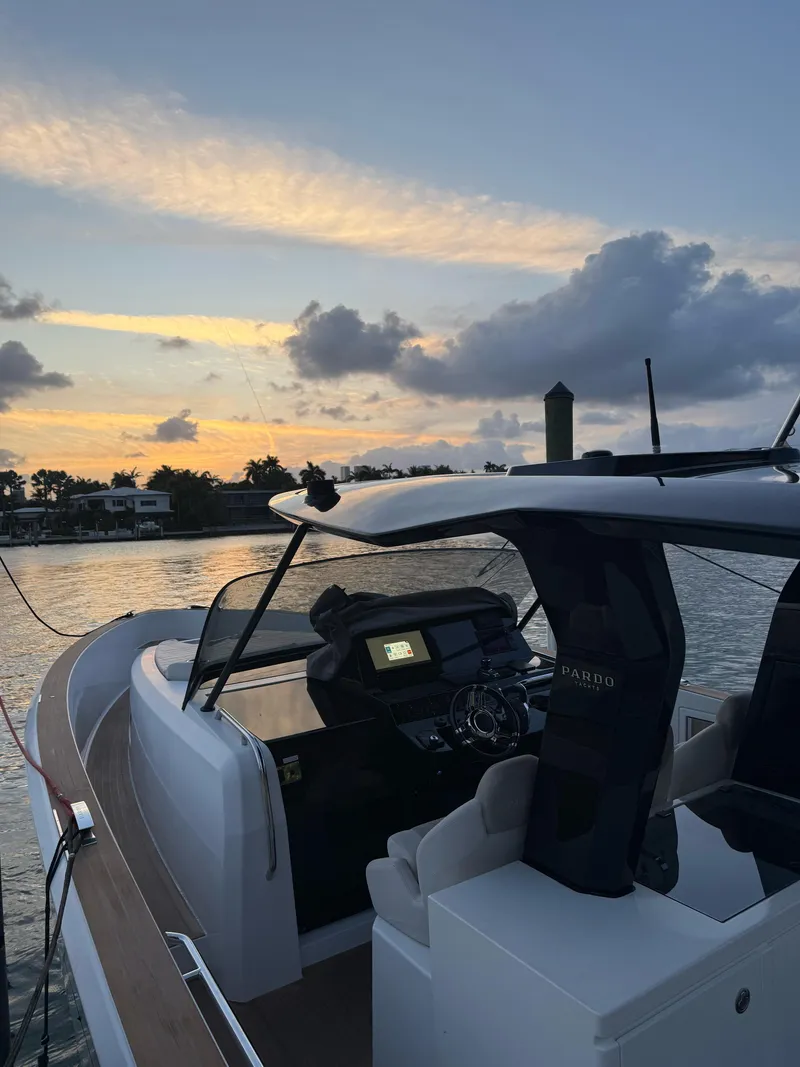 Slide: The Image of 2022 Pardo Yachts 38 at sunset, featuring sleek design and modern cockpit. - 2