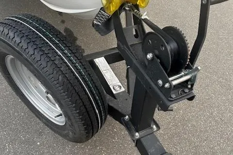 Slide: The Image of Trailer hitch and wheel of 2023 Tahoe 185 S boat on pavement. - 4