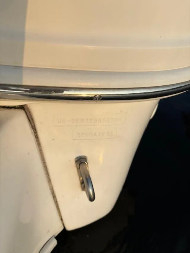 Slide: The Image of Close-up of 2004 Sea Ray 320 Sundancer boat hull with identification numbers. - 26