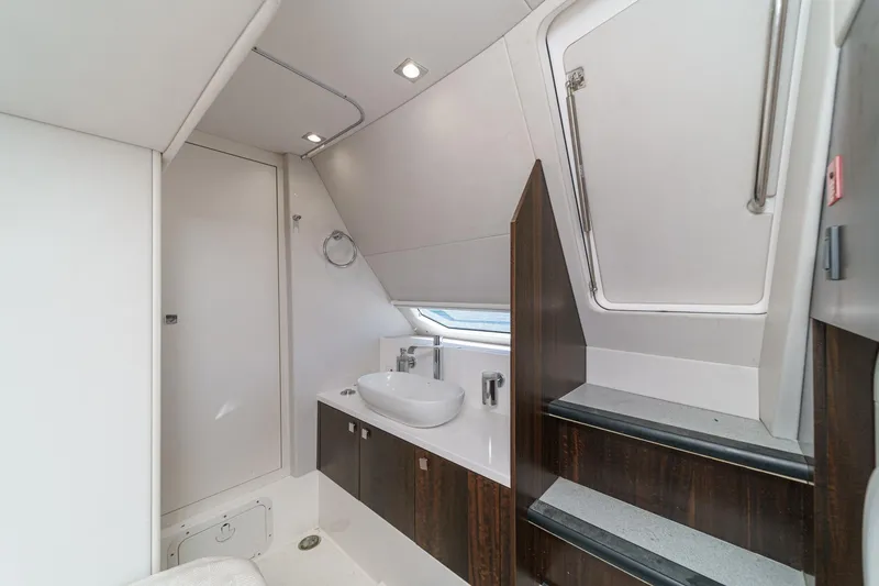 Slide: The Image of Luxurious bathroom interior of 2022 Sunseeker Manhattan 55 yacht, featuring modern fixtures. - 27