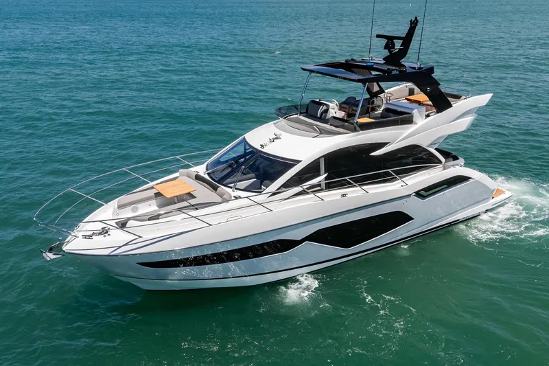 Slide: The Image of Luxury Sunseeker Manhattan 55 yacht cruising on open water, 2022 model. - 3