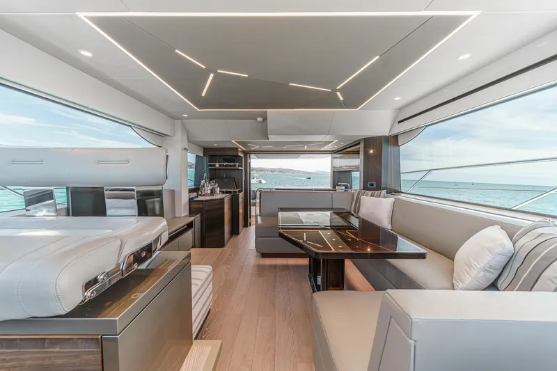 Slide: The Image of Luxurious interior of 2022 Sunseeker Manhattan 55 yacht with modern seating and ocean view. - 43