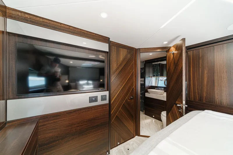 Slide: The Image of Luxurious interior of 2022 Sunseeker Manhattan 55 yacht with wood paneling and modern amenities. - 49