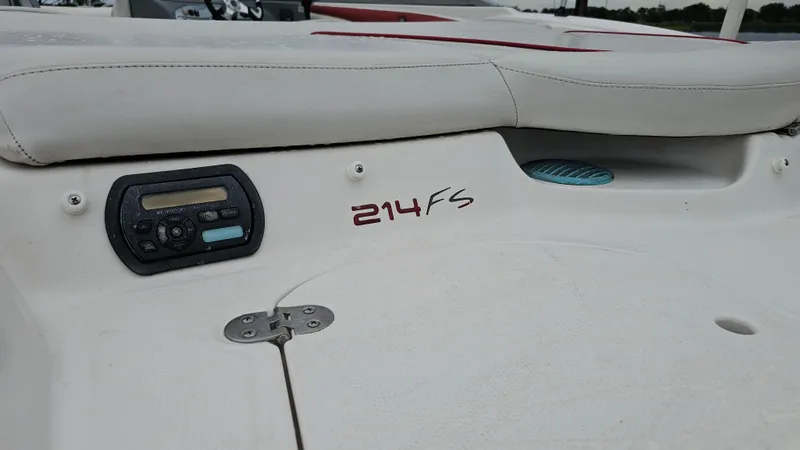 Slide: The Image of 2007 Monterey 214FS Montura boat interior with control panel and seating. - 10