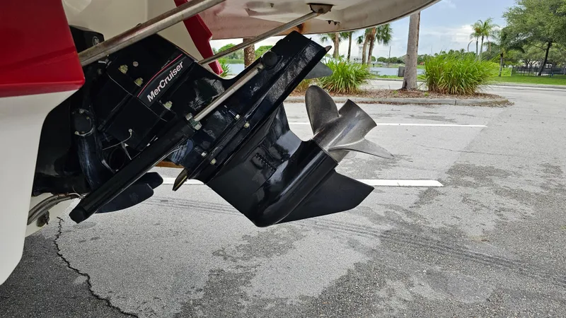 Slide: The Image of 2007 Monterey 214FS Montura boat with MerCruiser outdrive in a parking lot. - 15