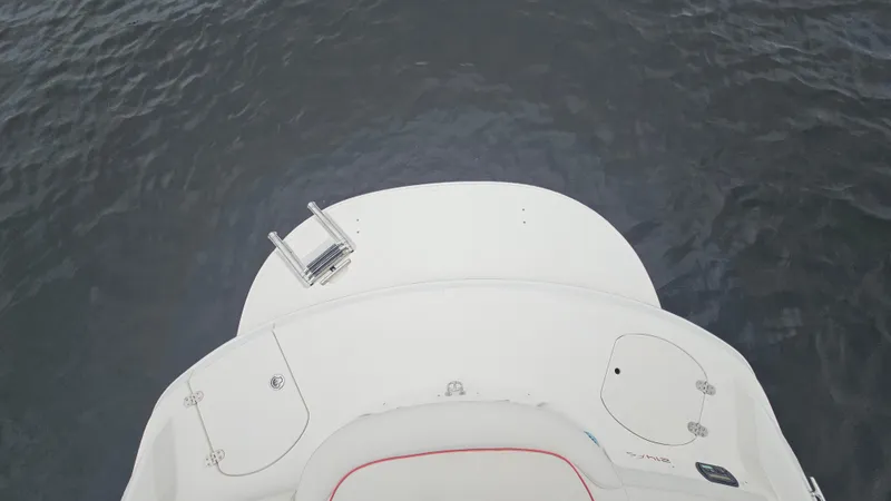 Slide: The Image of 2007 Monterey 214FS Montura boat stern with swim platform and ladder on water. - 29