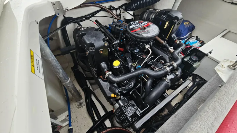 Slide: The Image of Engine compartment of a 2007 Monterey 214FS Montura boat with a 5.0L Mercury engine. - 33