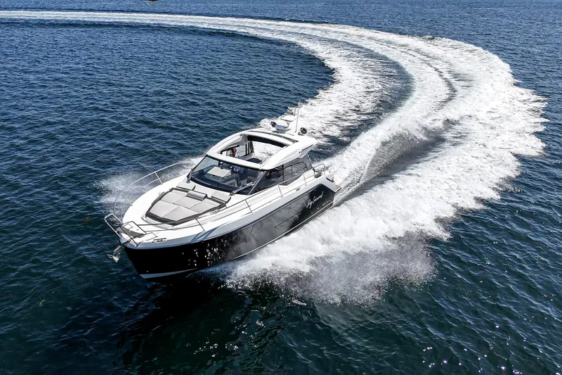 Slide: The Image of 2023 Bavaria SR36 yacht cruising swiftly on open water, creating a dynamic wake. - 7