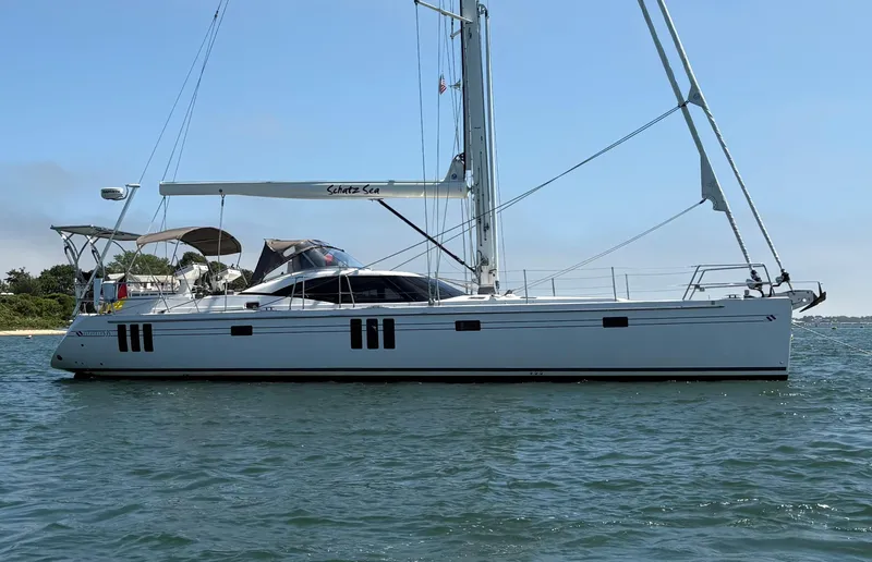 The Image of 2014 Southerly 535 yacht on calm water, side view, clear sky. - 0