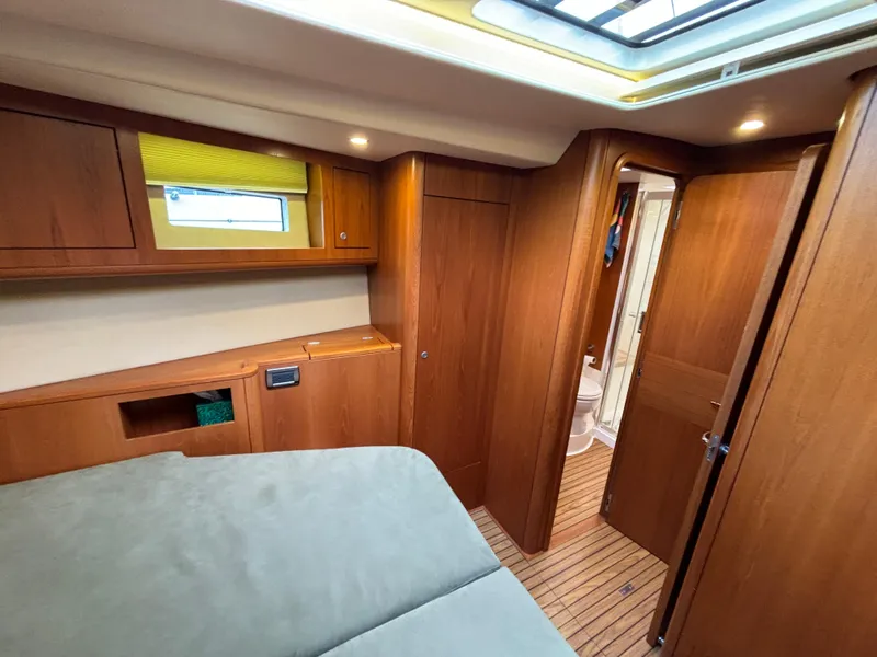 Slide: The Image of Luxurious interior of 2014 Southerly 535 yacht with wood finish and modern amenities. - 21