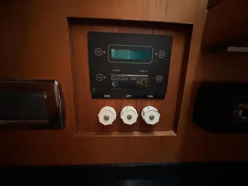 Slide: The Image of Control panel of a 2014 Southerly 535 yacht with knobs and display. - 48