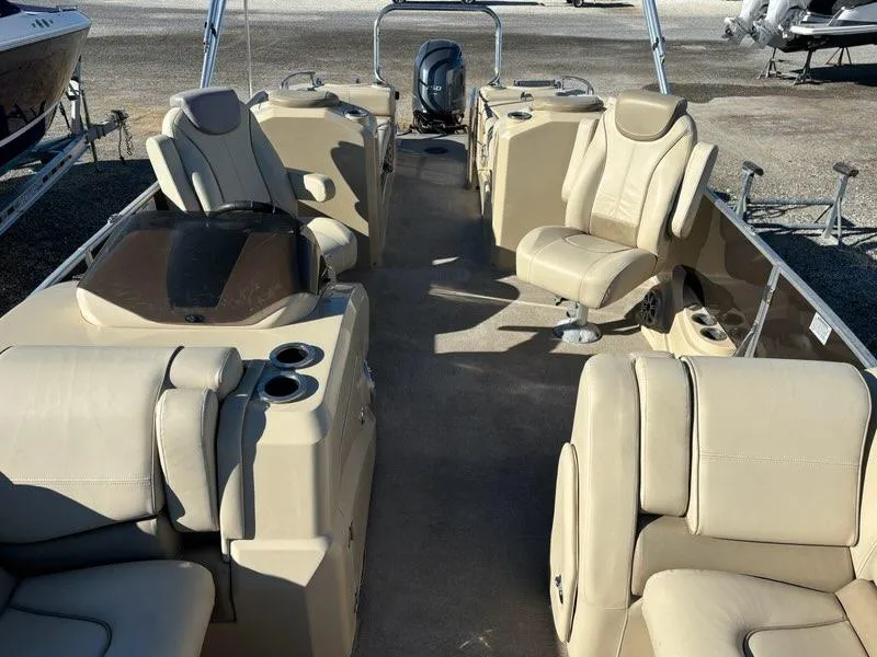 Slide: The Image of Luxurious 2018 Sylvan S3 boat interior with beige seating and modern design. - 14