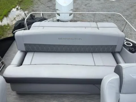 Slide: The Image of 2020 Bennington 24RTSBA boat seat with gray upholstery and cup holder. - 20
