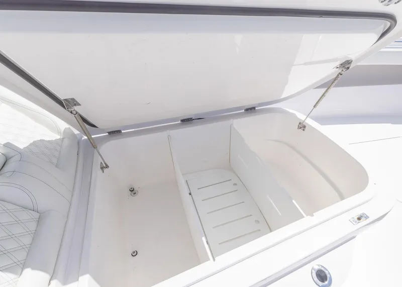 Slide: The Image of Open storage compartment on 2025 Invincible 43 Open Fisherman boat. - 10