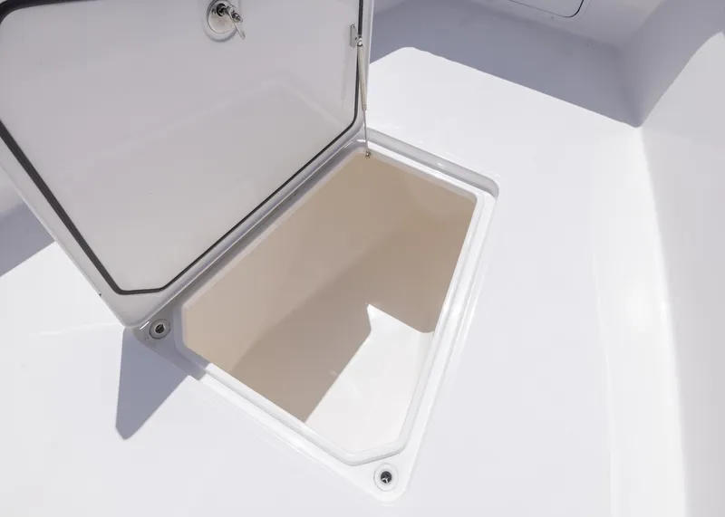 Slide: The Image of Open storage compartment on 2025 Invincible 43 Open Fisherman boat. - 11