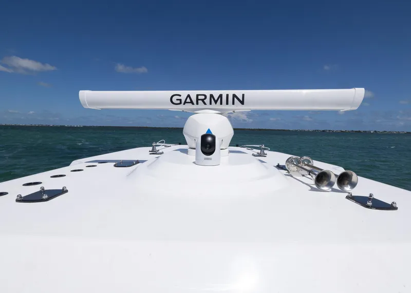 Slide: The Image of 2025 Invincible 43 Open Fisherman with Garmin radar on open water. - 14