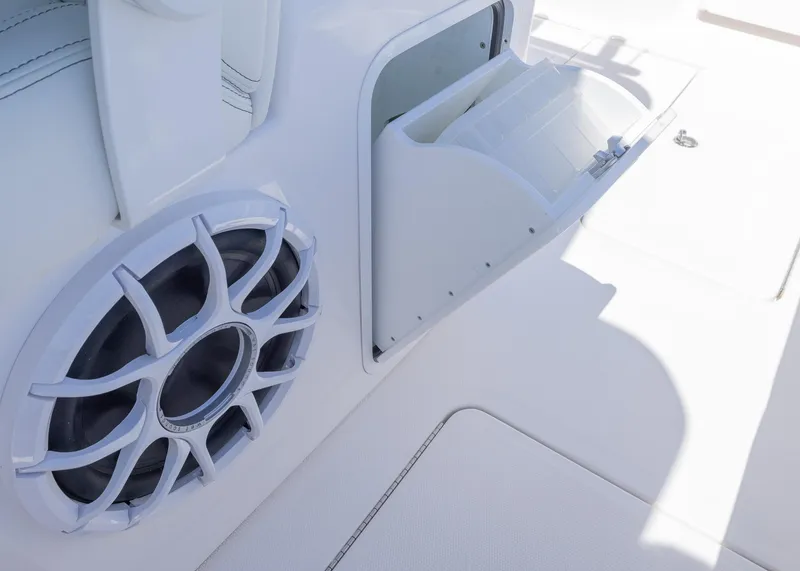 Slide: The Image of 2025 Invincible 43 Open Fisherman boat interior with speaker and storage compartment. - 31
