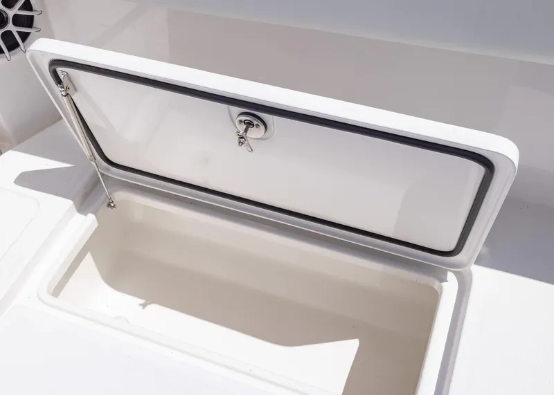 Slide: The Image of Open storage compartment on 2025 Invincible 43 Open Fisherman boat. - 38