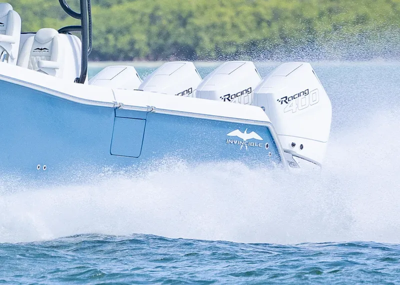 Slide: The Image of 2025 Invincible 43 Open Fisherman speeding on water with powerful engines. - 5