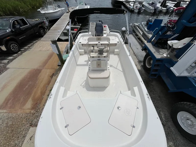 Slide: The Image of 2013 Carolina Skiff 178 DLV boat docked at marina, overhead view. - 10