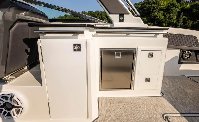 Slide: The Image of 2023 Cobalt R33 boat interior with sleek cabinetry and modern design elements. - 20