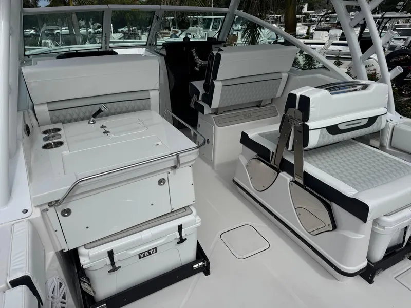 Slide: The Image of 2026 Blackfin 302 DC boat interior with seating and storage compartments. - 15
