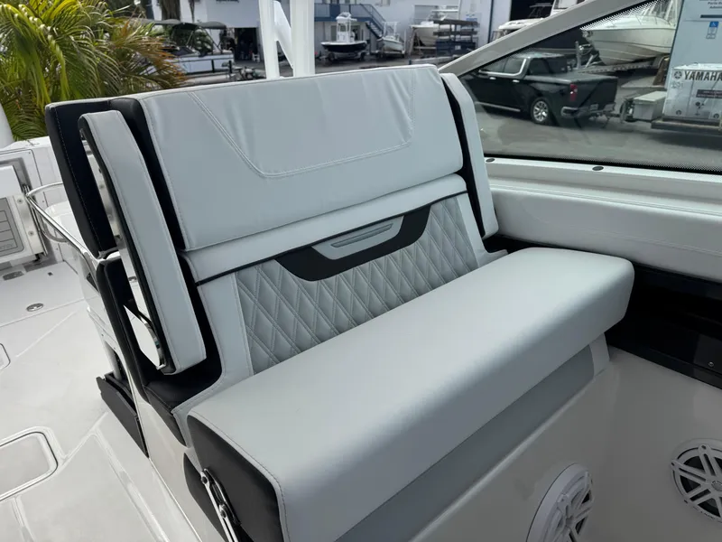 Slide: The Image of 2026 Blackfin 302 DC boat interior with luxurious seating and modern design. - 33