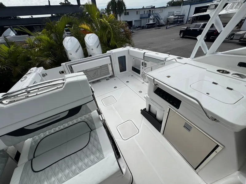 Slide: The Image of 2026 Blackfin 302 DC boat interior with seating and storage, showcasing modern design and functionality. - 35