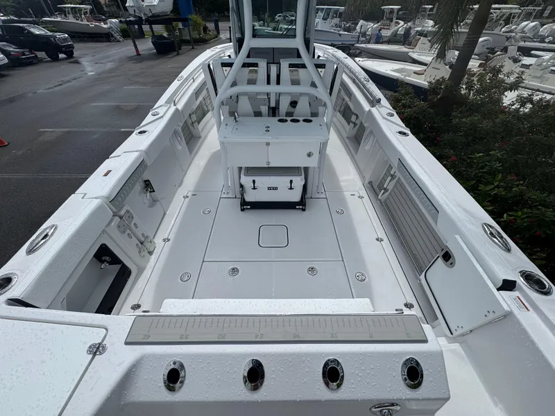 Slide: The Image of 2026 Blackfin 302 CC boat interior with spacious deck and modern features. - 10