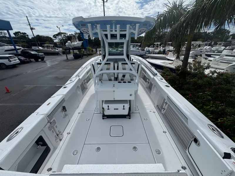 Slide: The Image of 2026 Blackfin 302 CC boat interior, featuring a sleek center console design and spacious deck. - 11