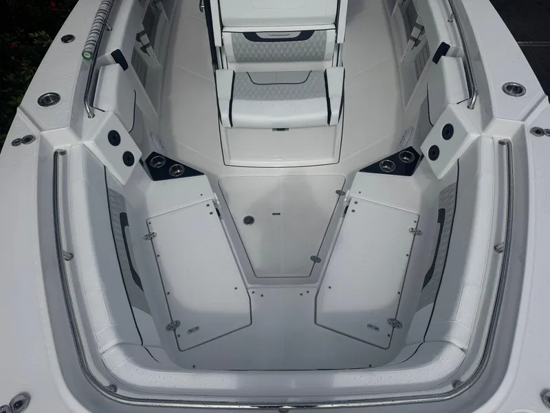 Slide: The Image of 2026 Blackfin 302 CC boat interior with seating and storage compartments. - 31