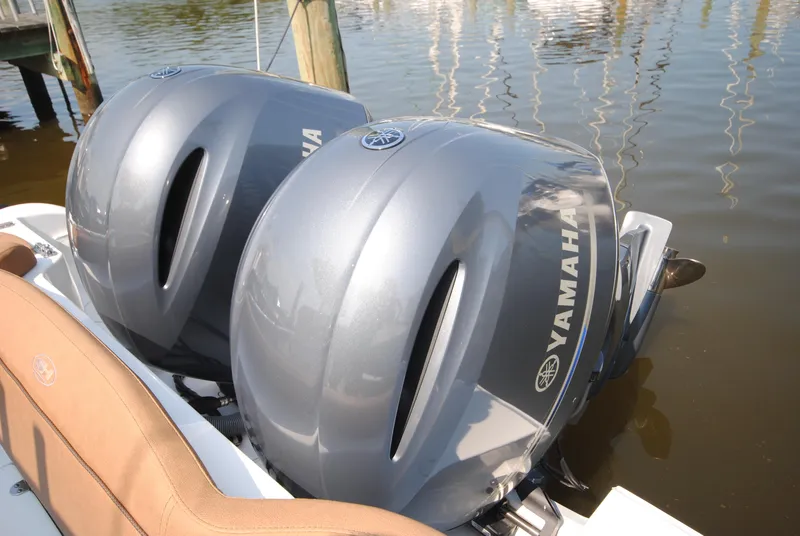 Slide: The Image of Twin Yamaha outboard engines on a 2022 Sea Hunt Ultra 265 SE boat. - 22