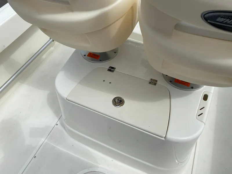 Slide: The Image of Boston Whaler 190 Outrage 2021 boat seating and storage compartment detail. - 26