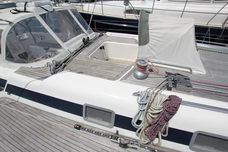 Slide: The Image of Deck of 1997 Nautor Swan 48 yacht with ropes and winch. - 12