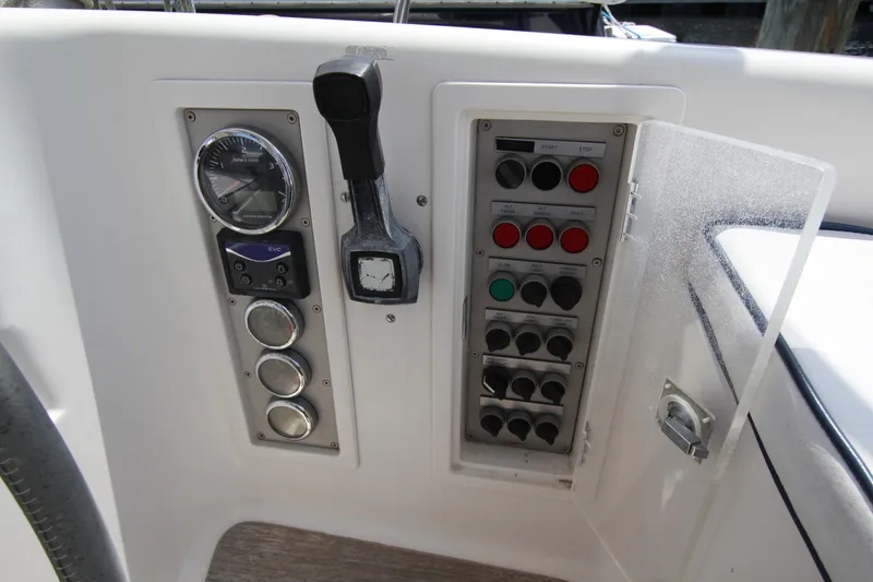 Slide: The Image of Control panel of a 1997 Nautor Swan 48 yacht, featuring gauges and switches. - 22