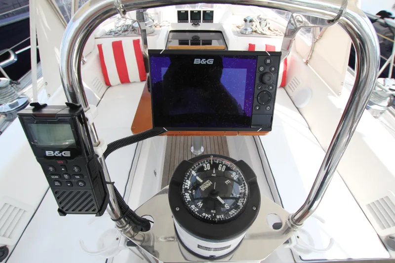 Slide: The Image of Cockpit of 1997 Nautor Swan 48 yacht with navigation equipment and compass. - 24