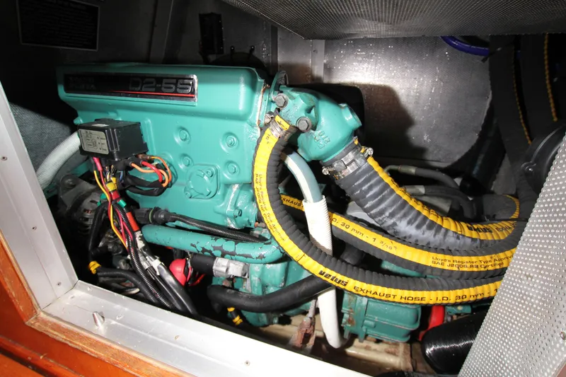 Slide: The Image of Engine compartment of a 1997 Nautor Swan 48 yacht, featuring a Volvo Penta D2-55 engine. - 39