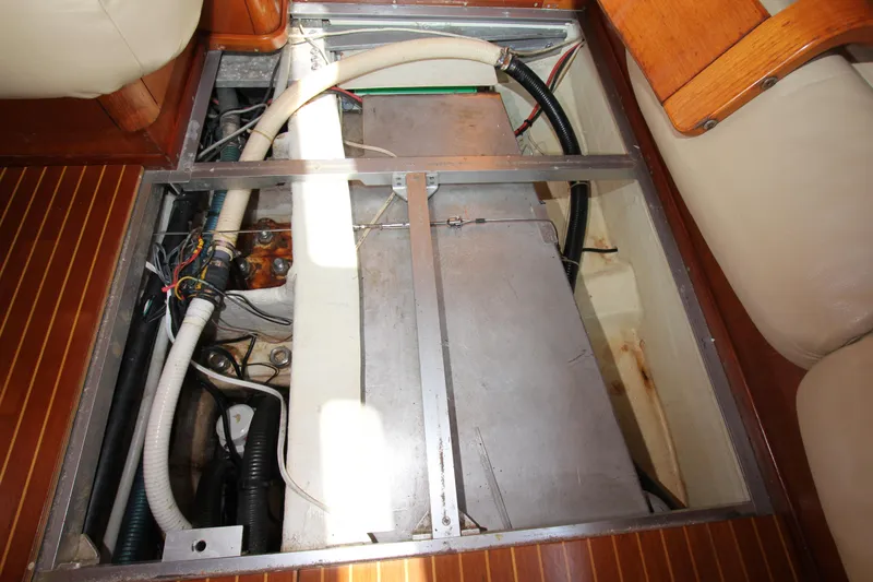 Slide: The Image of Engine compartment of 1997 Nautor Swan 48 yacht, showing wiring and hoses. - 40
