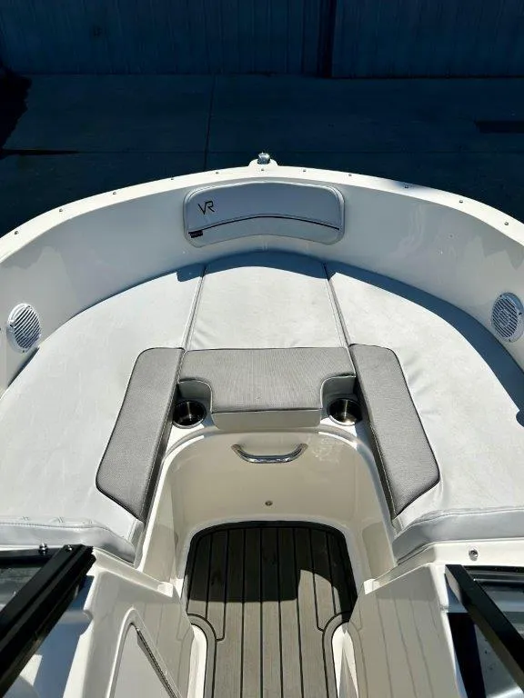 Slide: The Image of 2022 Bayliner VR4 Bowrider I/O boat interior with cushioned seating. - 3