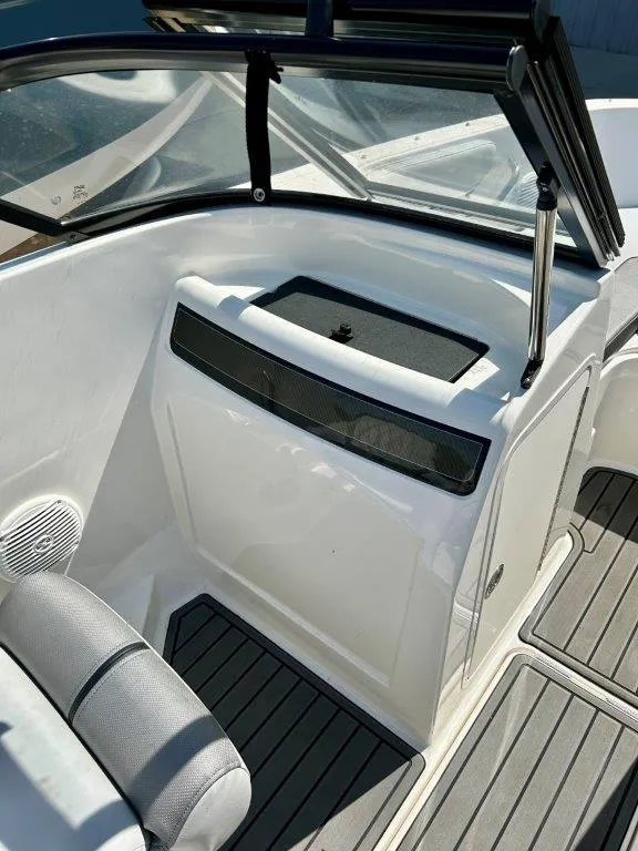 Slide: The Image of 2022 Bayliner VR4 Bowrider I/O interior with seating and dashboard. - 8