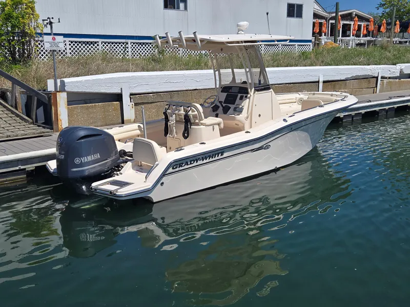 Slide: The Image of 2019 Grady-White Fisherman 216 boat docked with Yamaha engine. - 0