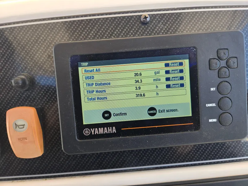 Slide: The Image of Yamaha boat display showing trip data on a 2019 Grady-White Fisherman 216. - 17