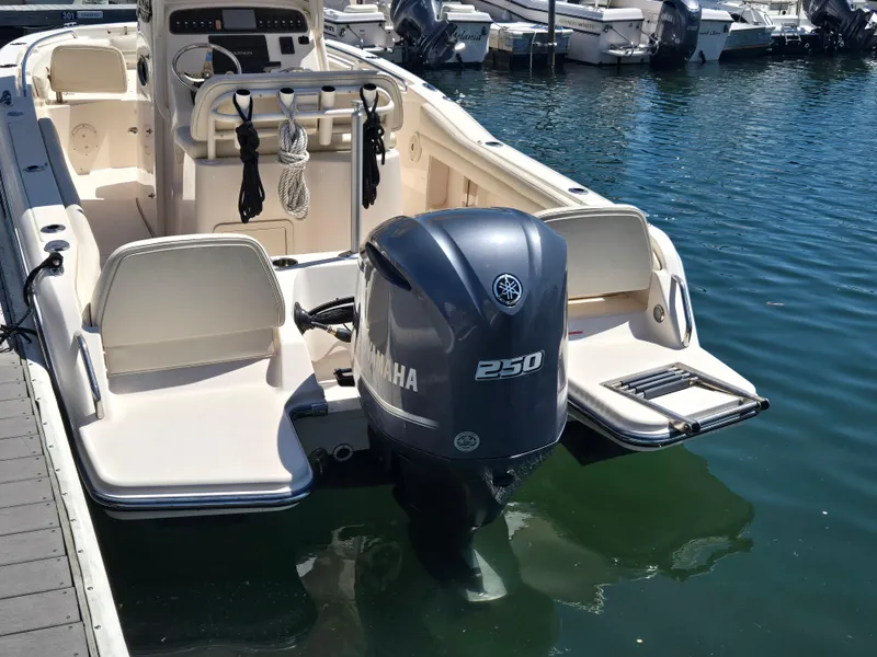 Slide: The Image of 2019 Grady-White Fisherman 216 boat with Yamaha 250 engine docked in marina. - 4