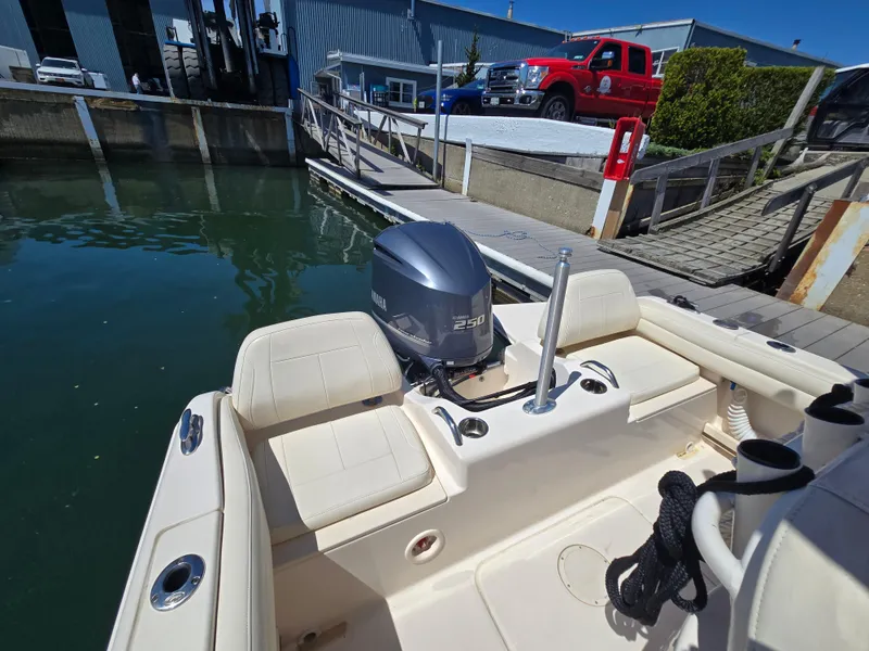 Slide: The Image of 2019 Grady-White Fisherman 216 boat with Yamaha 250 engine docked at marina. - 5