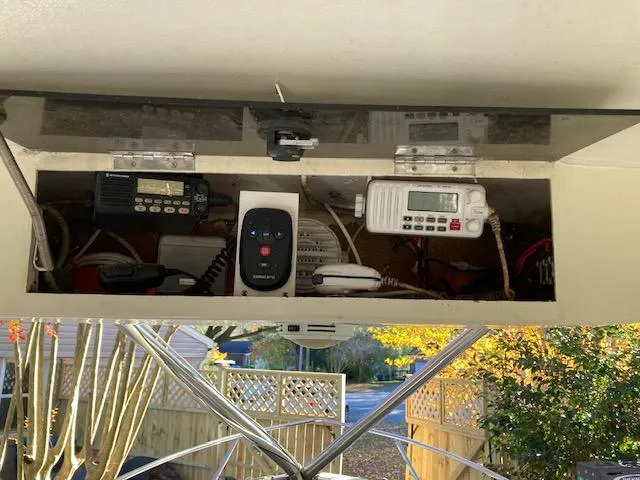 Slide: The Image of 1986 Albemarle 24 Cuddy boat electronics compartment with communication devices. - 4